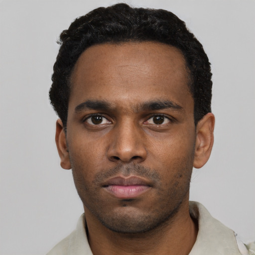 Neutral black young-adult male with short  black hair and brown eyes