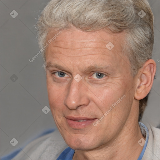 Joyful white middle-aged male with short  brown hair and brown eyes