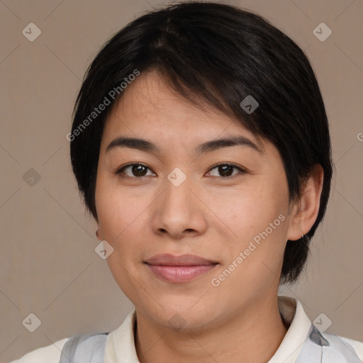 Joyful asian young-adult female with medium  brown hair and brown eyes