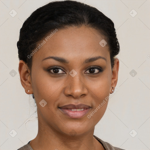 Joyful black young-adult female with short  brown hair and brown eyes