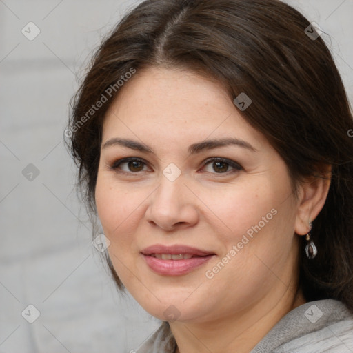 Joyful white adult female with medium  brown hair and brown eyes