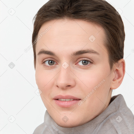 Joyful white young-adult female with short  brown hair and grey eyes