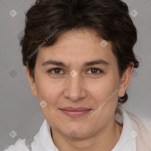 Joyful white adult female with short  brown hair and brown eyes