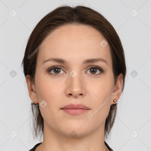 Neutral white young-adult female with medium  brown hair and brown eyes