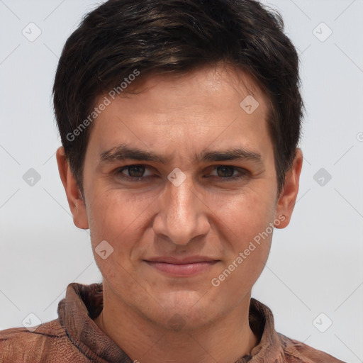 Joyful white adult male with short  brown hair and brown eyes