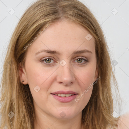 Joyful white young-adult female with long  brown hair and green eyes