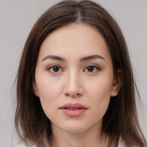 Neutral white young-adult female with medium  brown hair and brown eyes