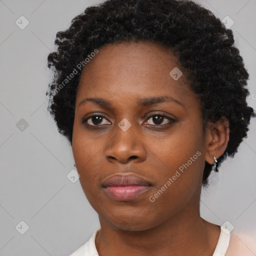 Neutral black young-adult female with short  black hair and brown eyes