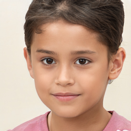 Joyful white child female with short  brown hair and brown eyes