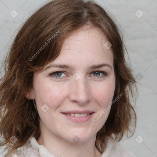 Joyful white young-adult female with medium  brown hair and blue eyes