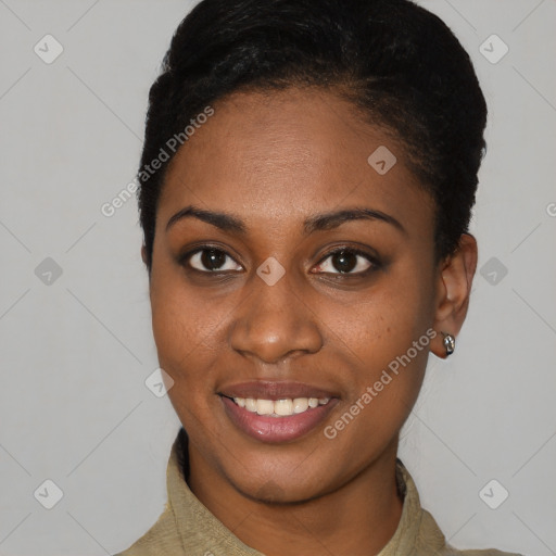 Joyful black young-adult female with short  brown hair and brown eyes