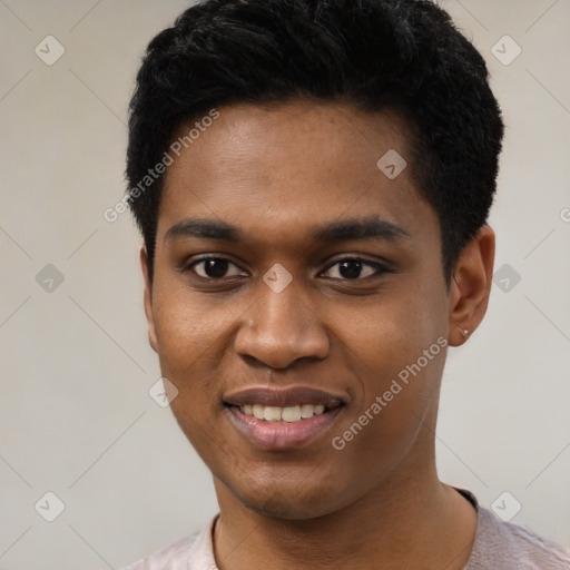 Joyful black young-adult male with short  black hair and brown eyes