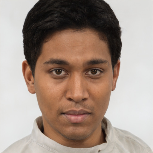 Neutral asian young-adult male with short  brown hair and brown eyes