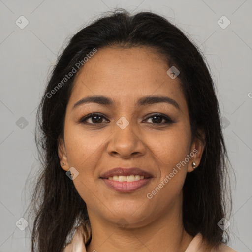 Joyful latino young-adult female with medium  brown hair and brown eyes