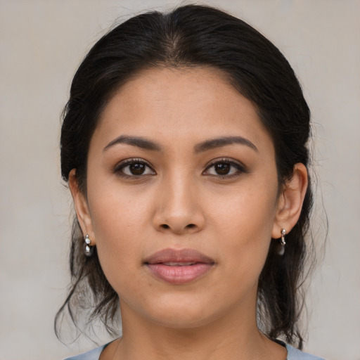 Joyful asian young-adult female with medium  brown hair and brown eyes