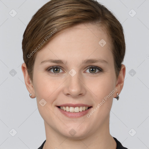 Joyful white young-adult female with short  brown hair and grey eyes