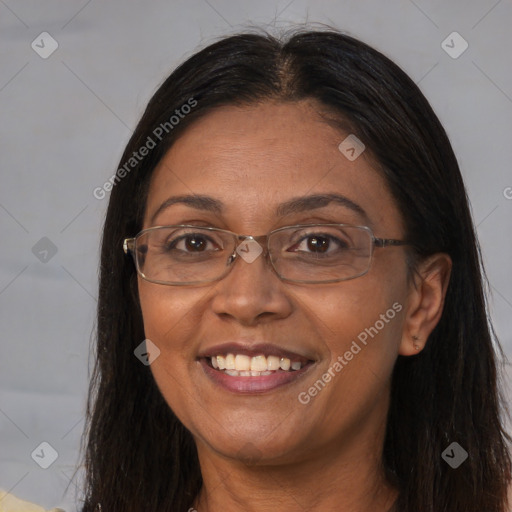 Joyful white adult female with long  brown hair and brown eyes