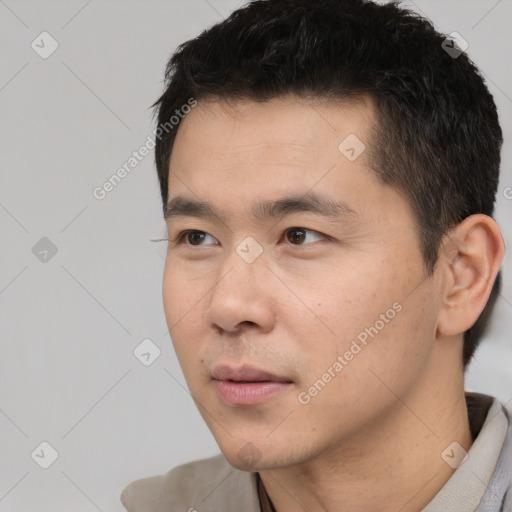Neutral white young-adult male with short  black hair and brown eyes