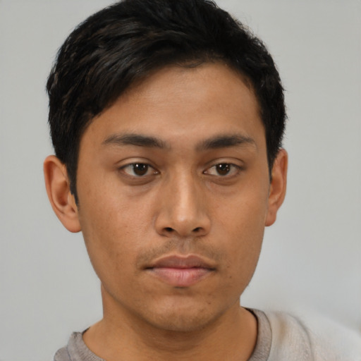 Neutral asian young-adult male with short  brown hair and brown eyes
