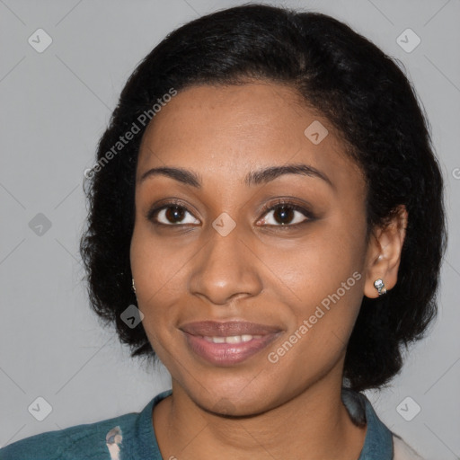 Joyful black young-adult female with medium  brown hair and brown eyes