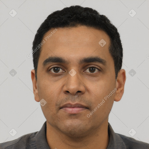 Neutral latino young-adult male with short  black hair and brown eyes