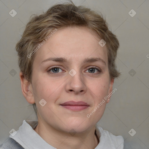 Joyful white young-adult female with short  brown hair and grey eyes