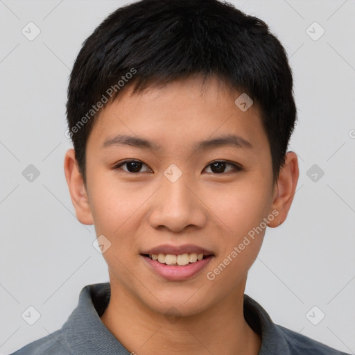 Joyful asian child male with short  brown hair and brown eyes