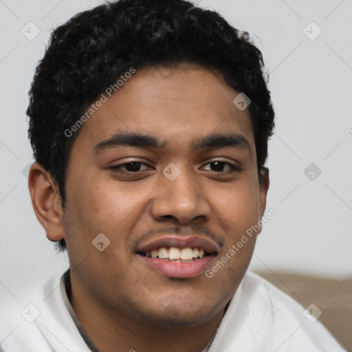 Joyful latino young-adult male with short  brown hair and brown eyes