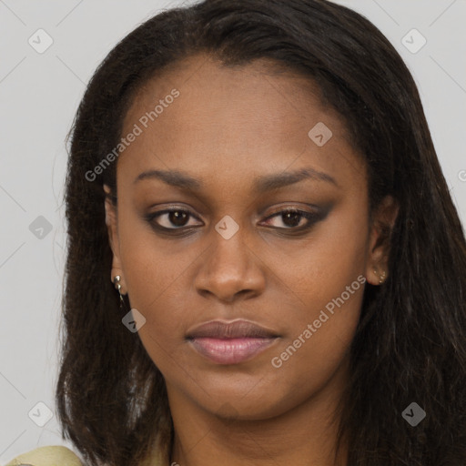 Neutral black young-adult female with long  brown hair and brown eyes