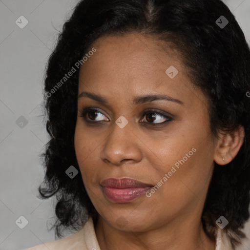 Joyful black young-adult female with medium  brown hair and brown eyes