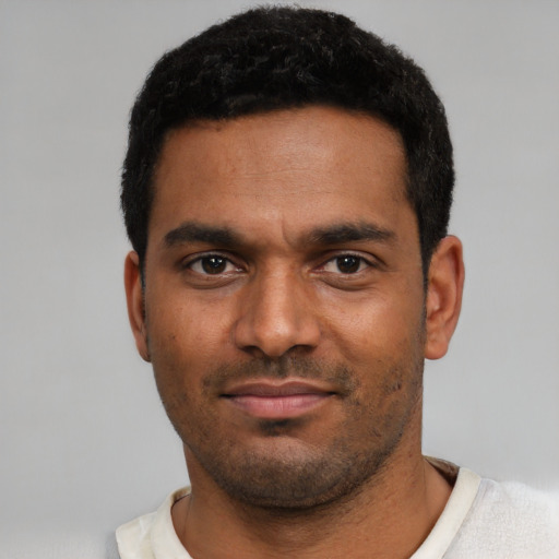 Neutral black young-adult male with short  black hair and brown eyes