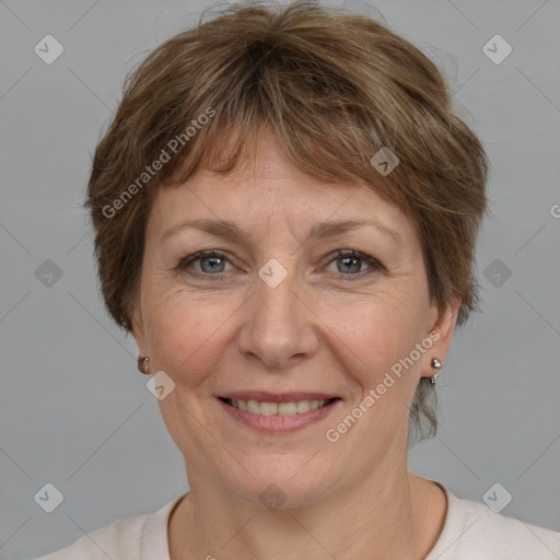 Joyful white adult female with short  brown hair and brown eyes