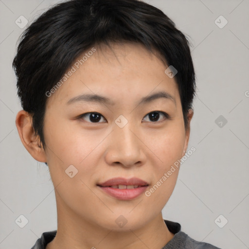 Joyful asian young-adult female with short  brown hair and brown eyes