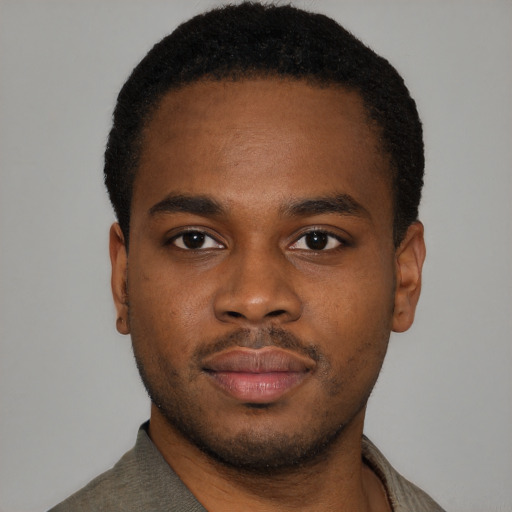 Neutral black young-adult male with short  brown hair and brown eyes