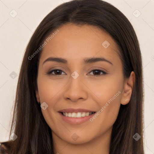 Joyful latino young-adult female with long  brown hair and brown eyes