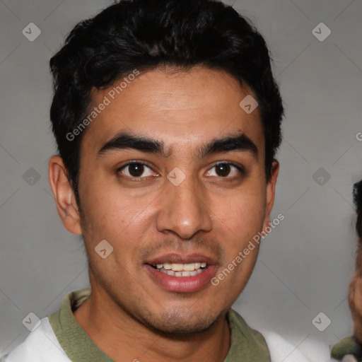 Joyful white young-adult male with short  black hair and brown eyes