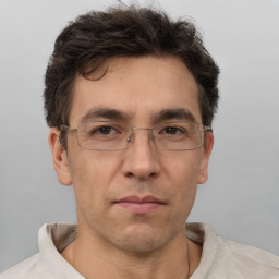 Neutral white adult male with short  brown hair and brown eyes