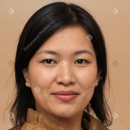 Joyful asian adult female with medium  brown hair and brown eyes