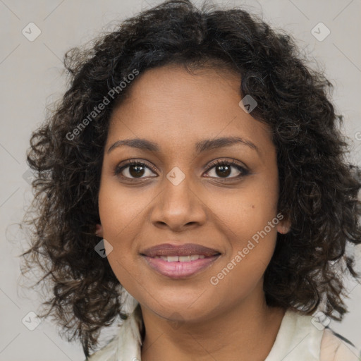 Joyful black young-adult female with long  brown hair and brown eyes