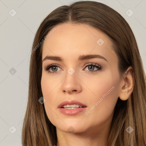 Neutral white young-adult female with long  brown hair and brown eyes