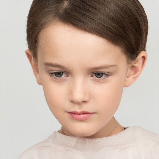 Neutral white child female with short  brown hair and brown eyes