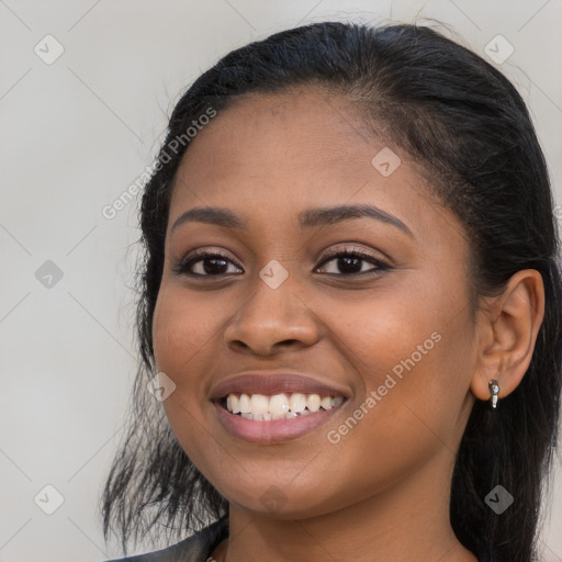 Joyful latino young-adult female with long  brown hair and brown eyes