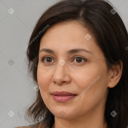 Joyful white adult female with medium  brown hair and brown eyes