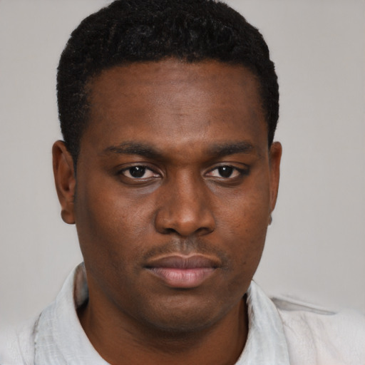 Neutral black young-adult male with short  brown hair and brown eyes