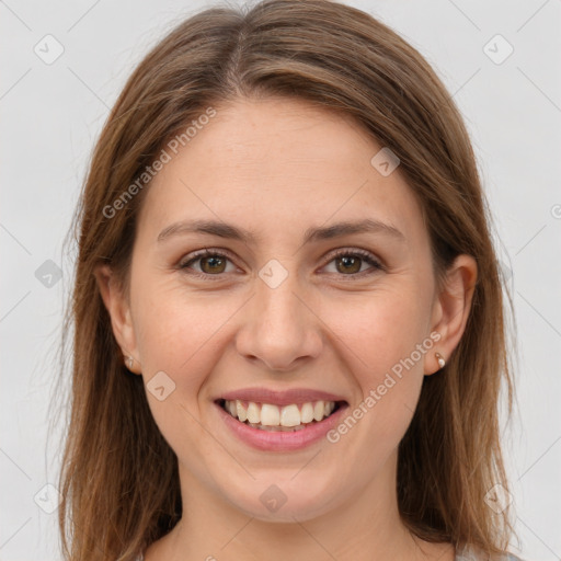 Joyful white young-adult female with long  brown hair and grey eyes