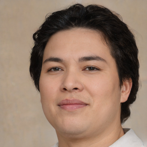 Joyful white young-adult male with medium  brown hair and brown eyes