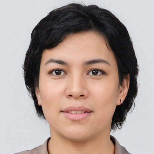 Joyful asian young-adult female with medium  black hair and brown eyes