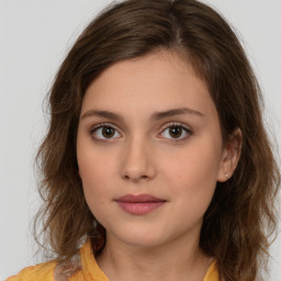 Neutral white young-adult female with medium  brown hair and brown eyes