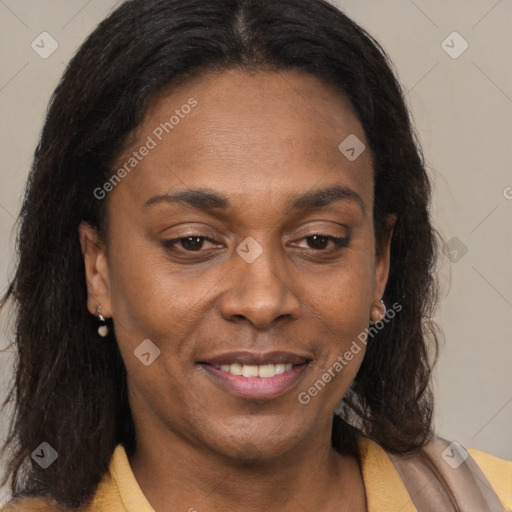 Joyful latino adult female with medium  brown hair and brown eyes