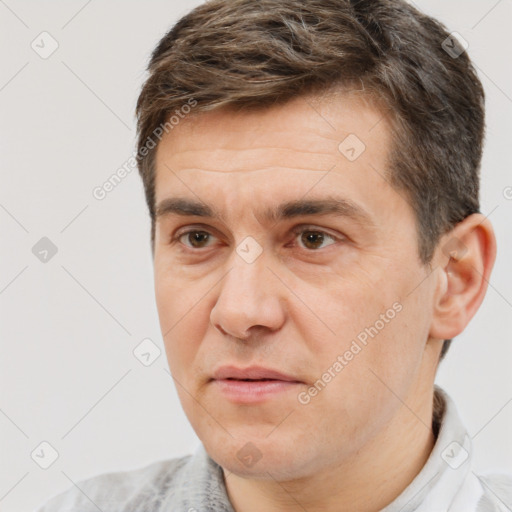 Neutral white adult male with short  brown hair and brown eyes